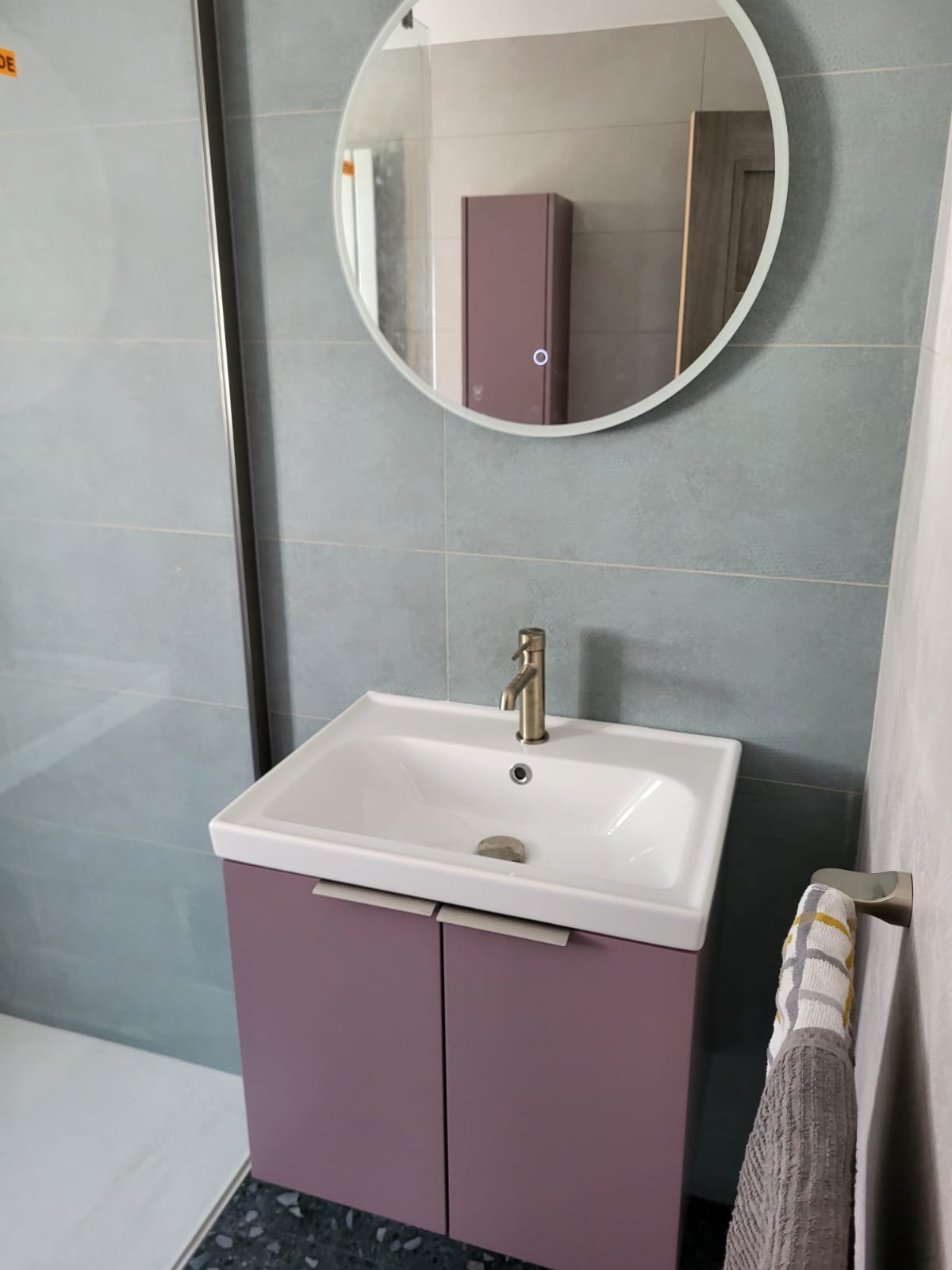 Bathroom with pink vanity