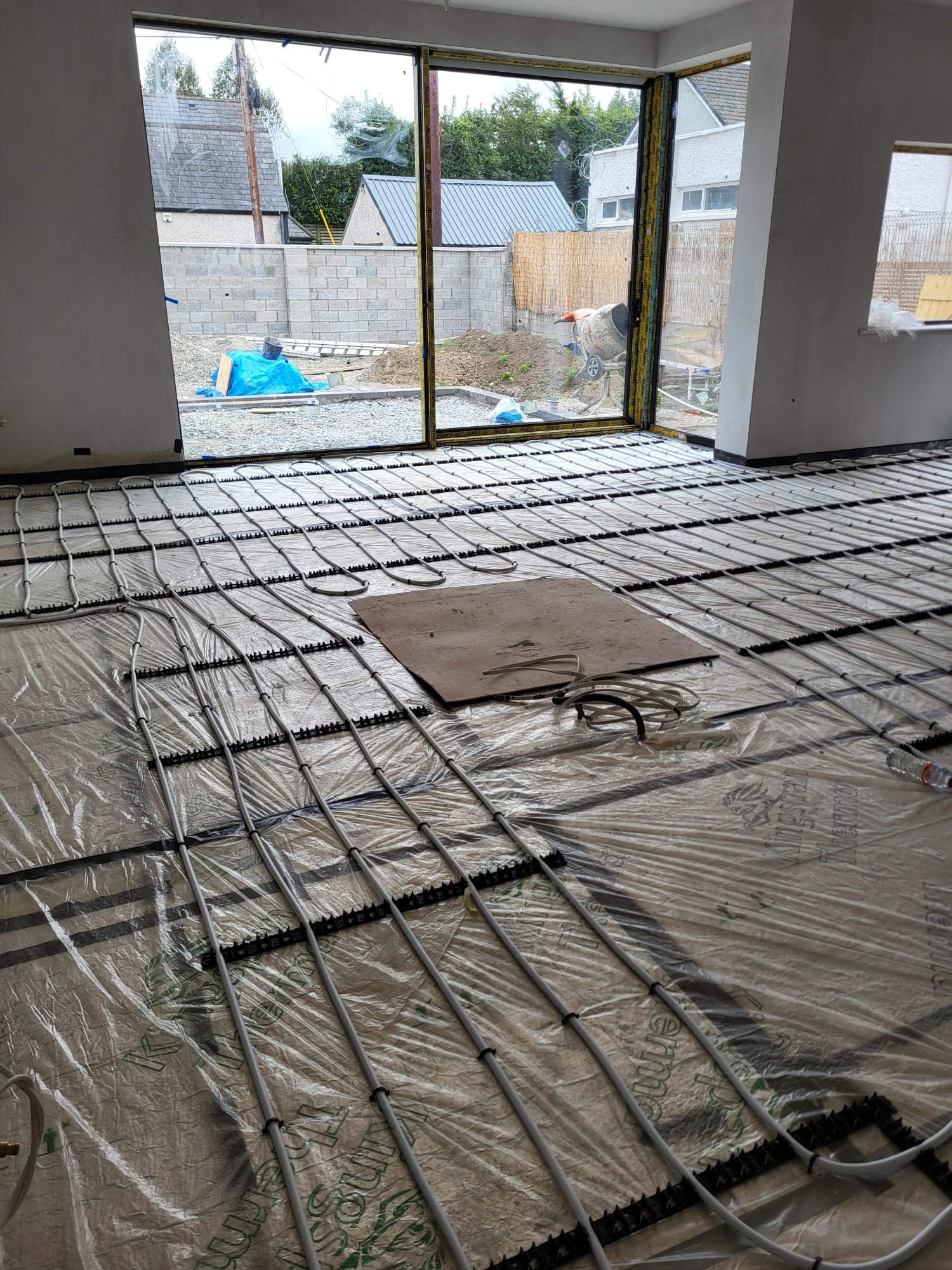 Garden room with black metal roof and wooden frame structure