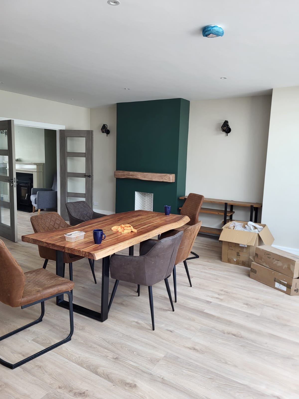 Green fireplace feature wall