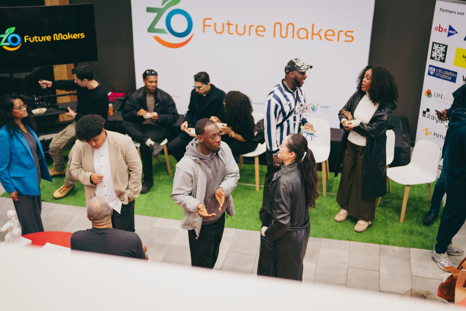 Community members networking and testing ideas in a living lab environment