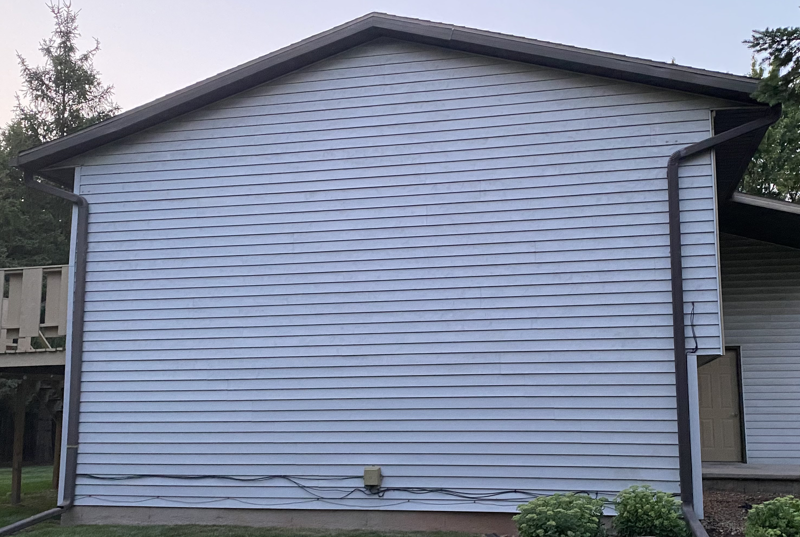 Finished siding repair example on a Wisconsin home