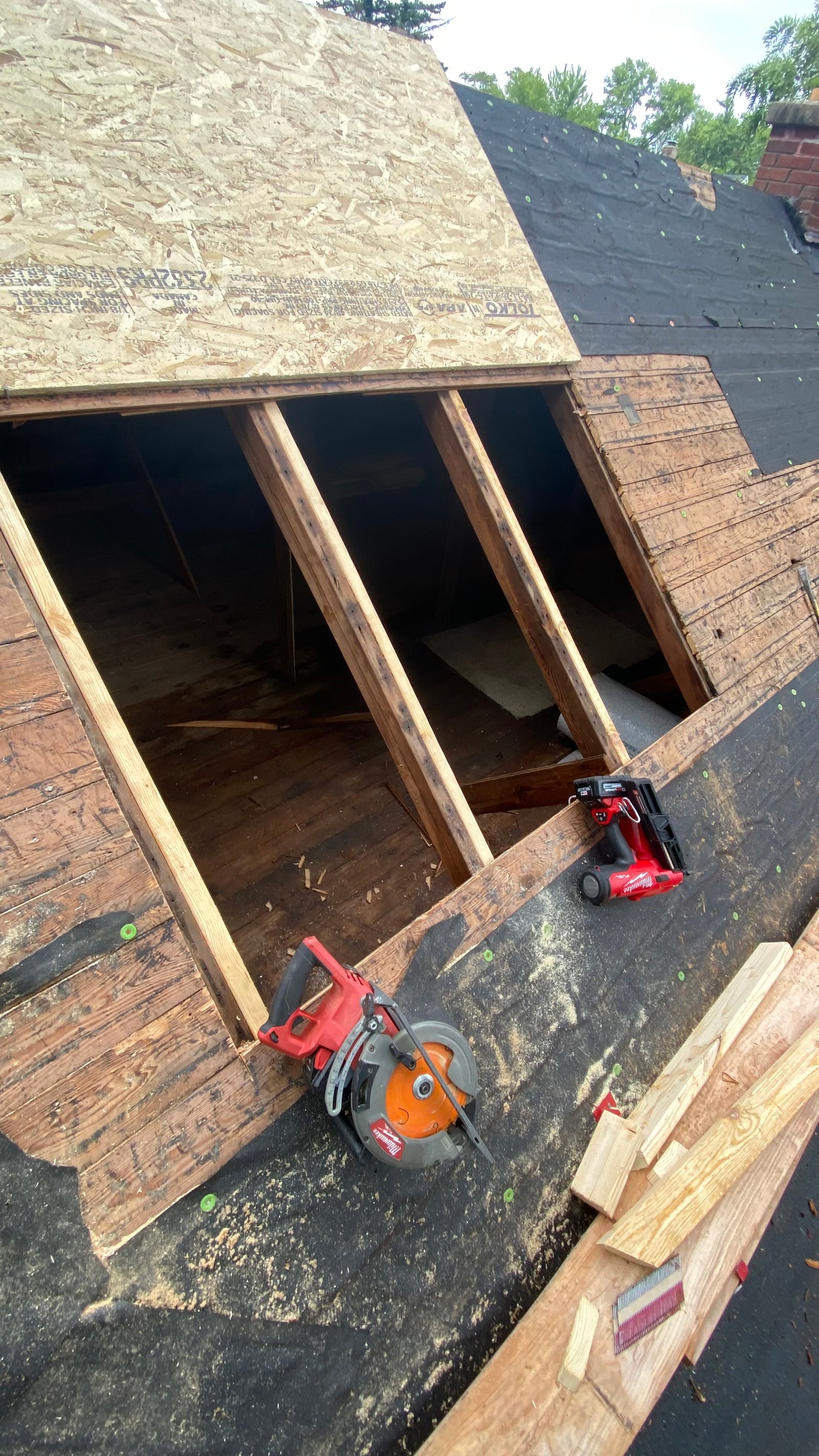 Missing shingle on a roof in the Appleton area, before repair