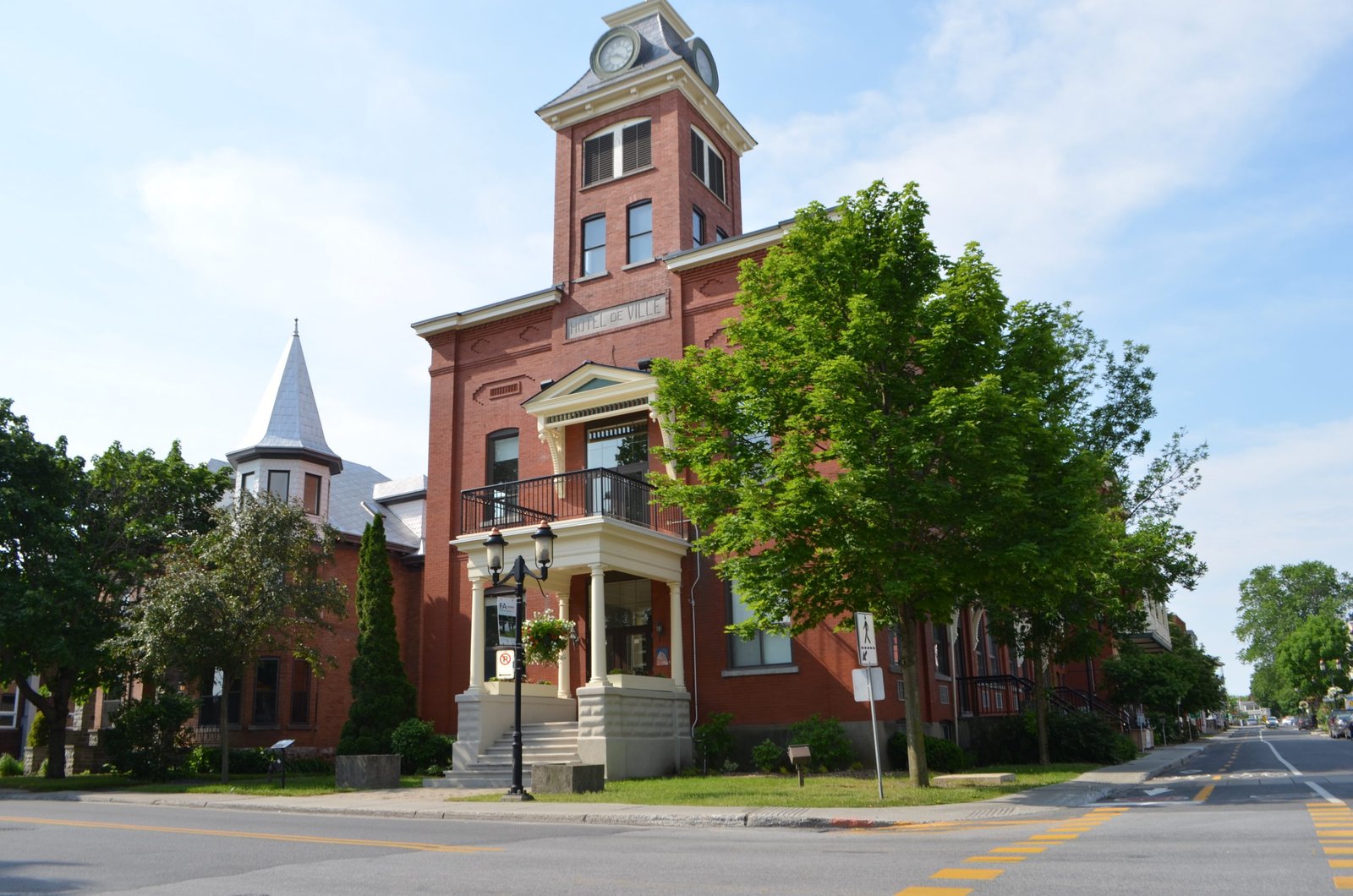 Historic municipal building with clock tower — local government GIS client