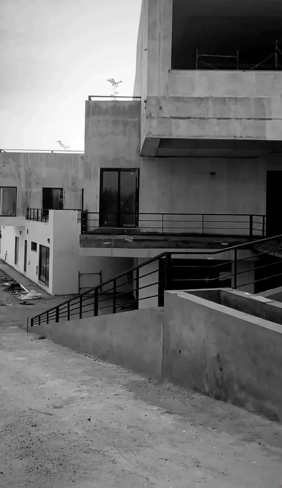 Zoha Farm SCIP structure under construction with concrete terraces and railings