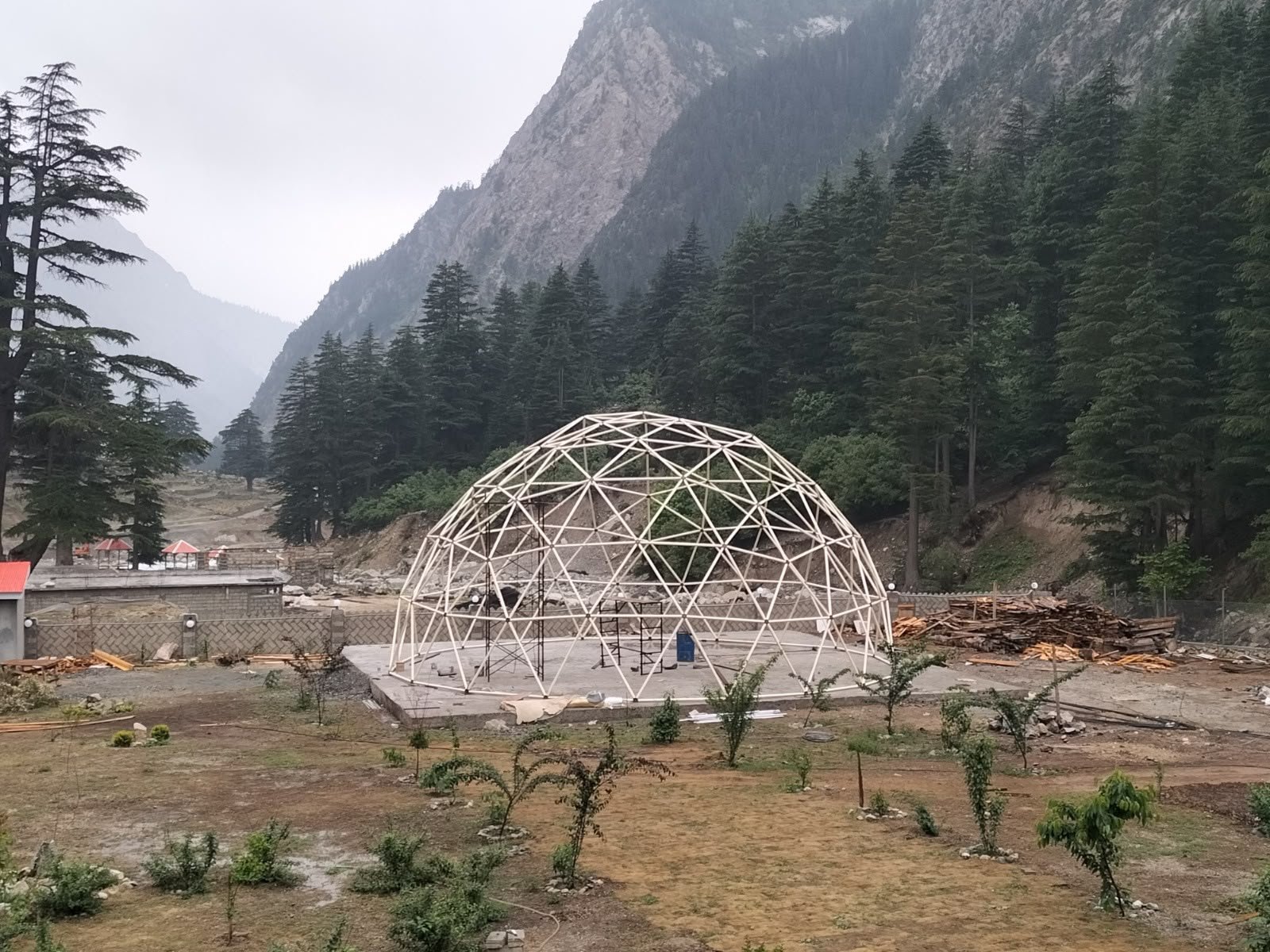 Completed white Event Dome frame on a mountain site in Kalam