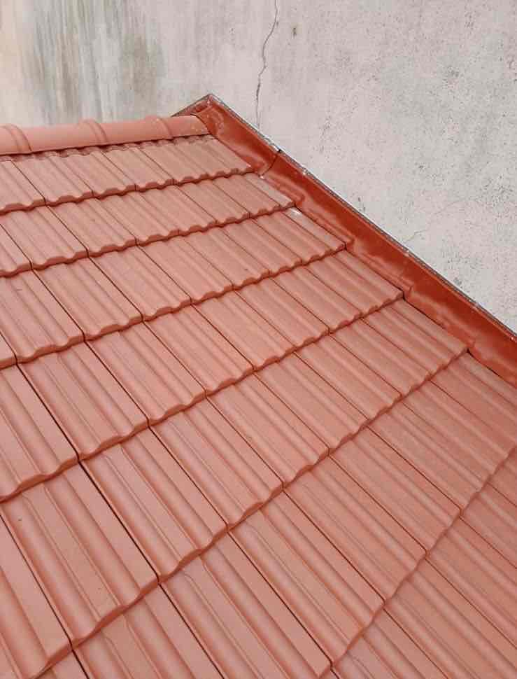 Après travaux - Rénovation de toiture avec tuiles neuves
