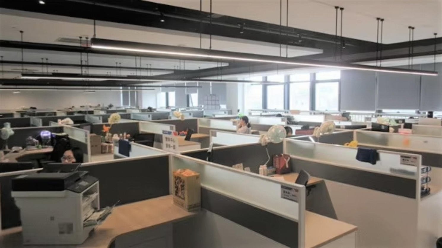 Modern office workspace with professional team