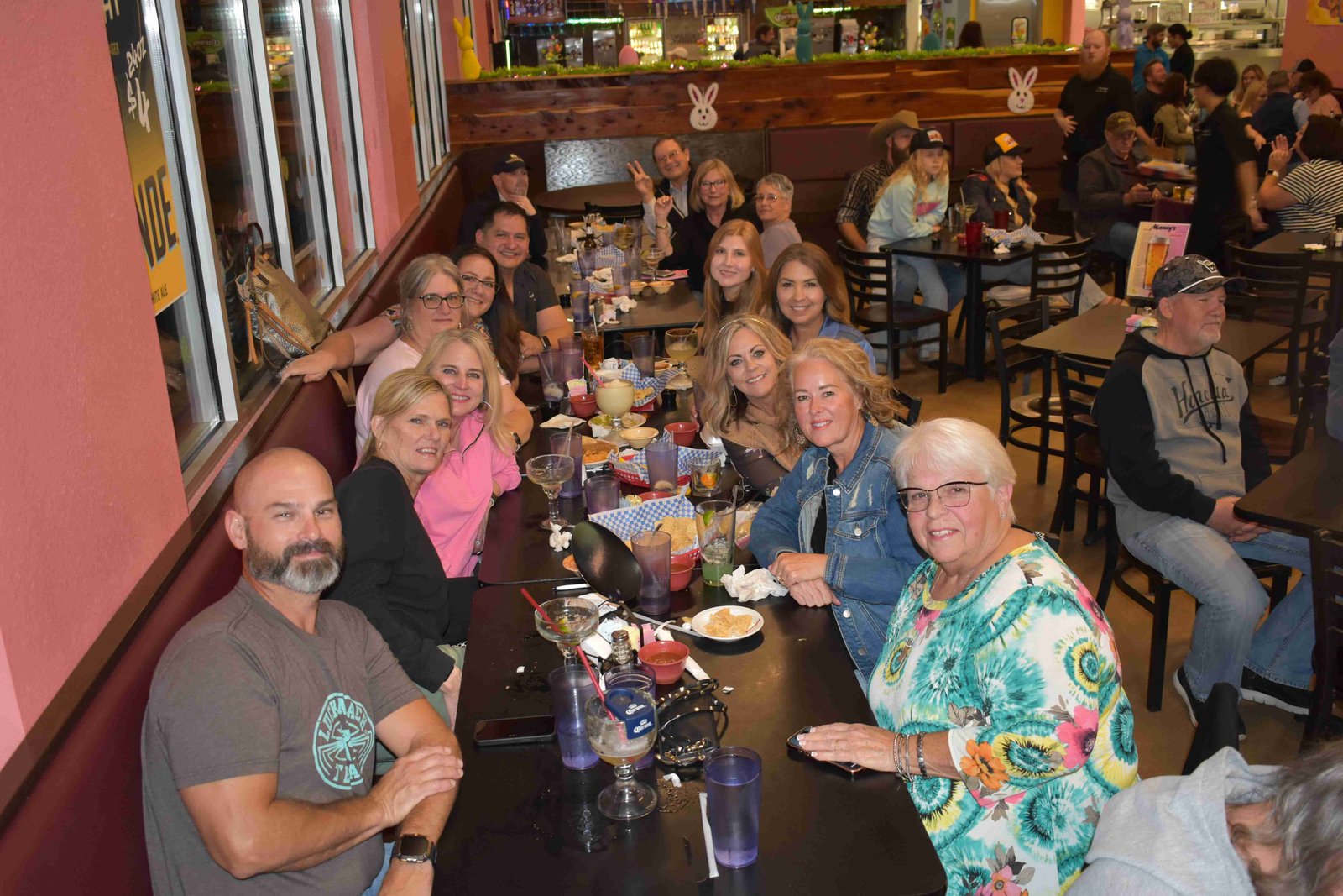A family sharing dinner at Manny's