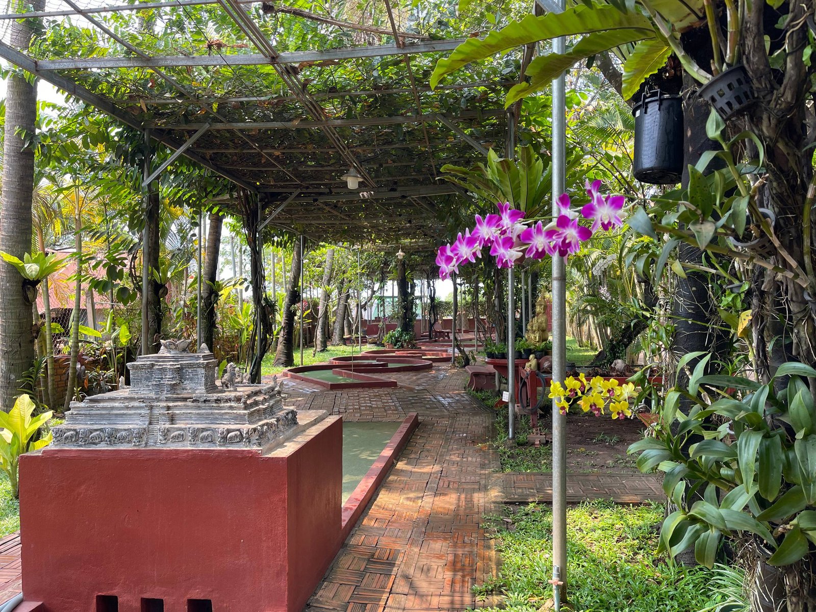 Temple replica and orchid-lined fairway