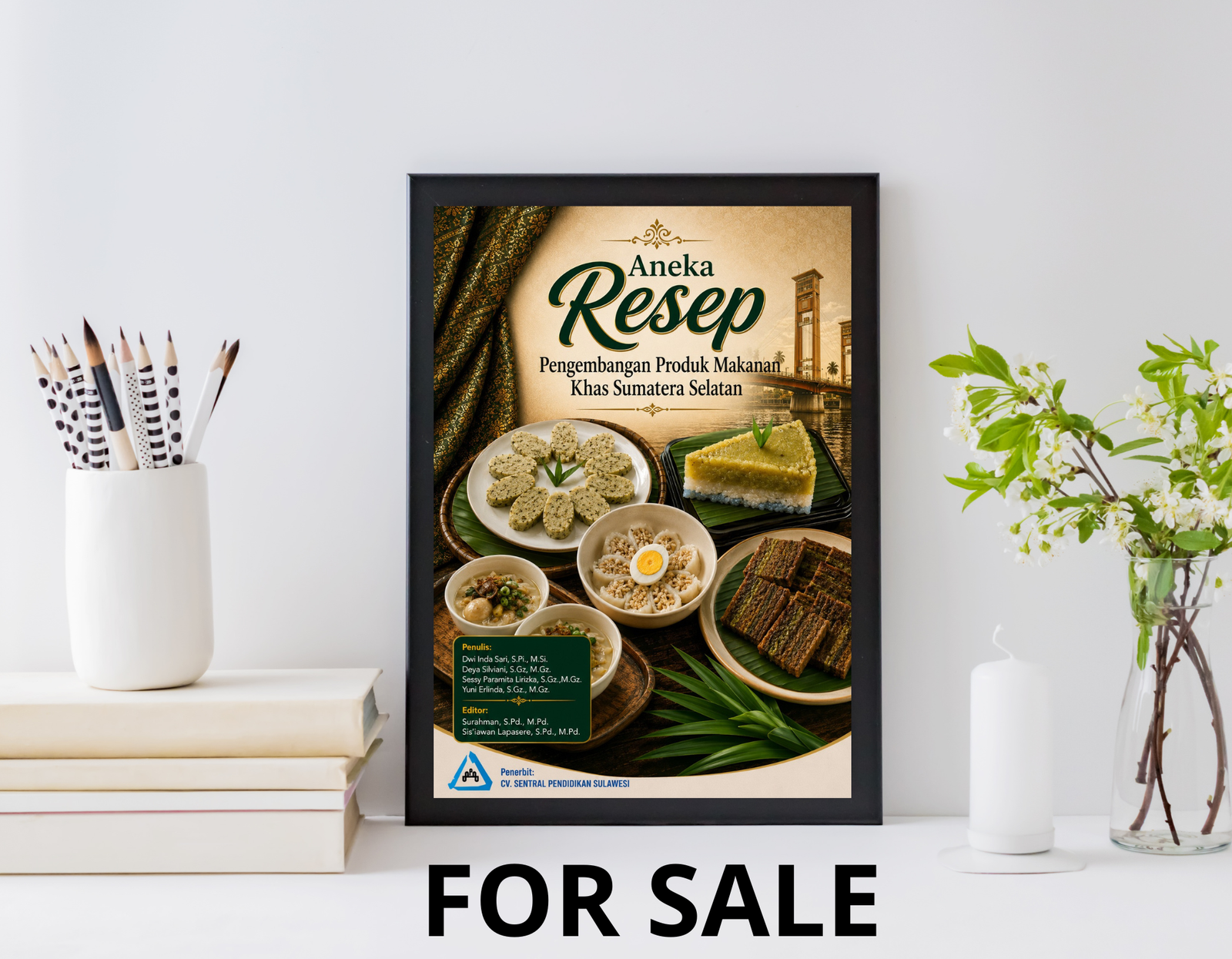 Book cover for 'Aneka Resep Pengembangan Produk Makanan Khas Sumatera Selatan' displayed in a black frame