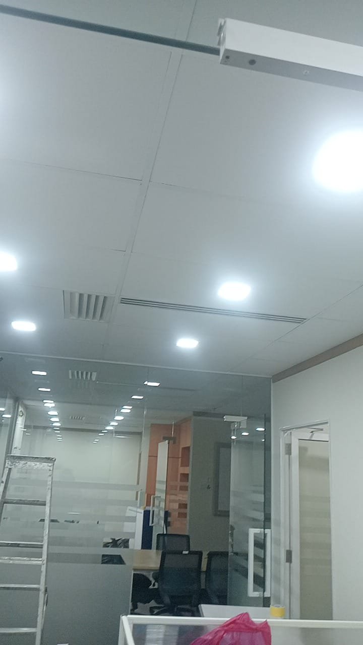 Ceiling view of GD Properties Megan Avenue II office with glass partitions and LED downlights