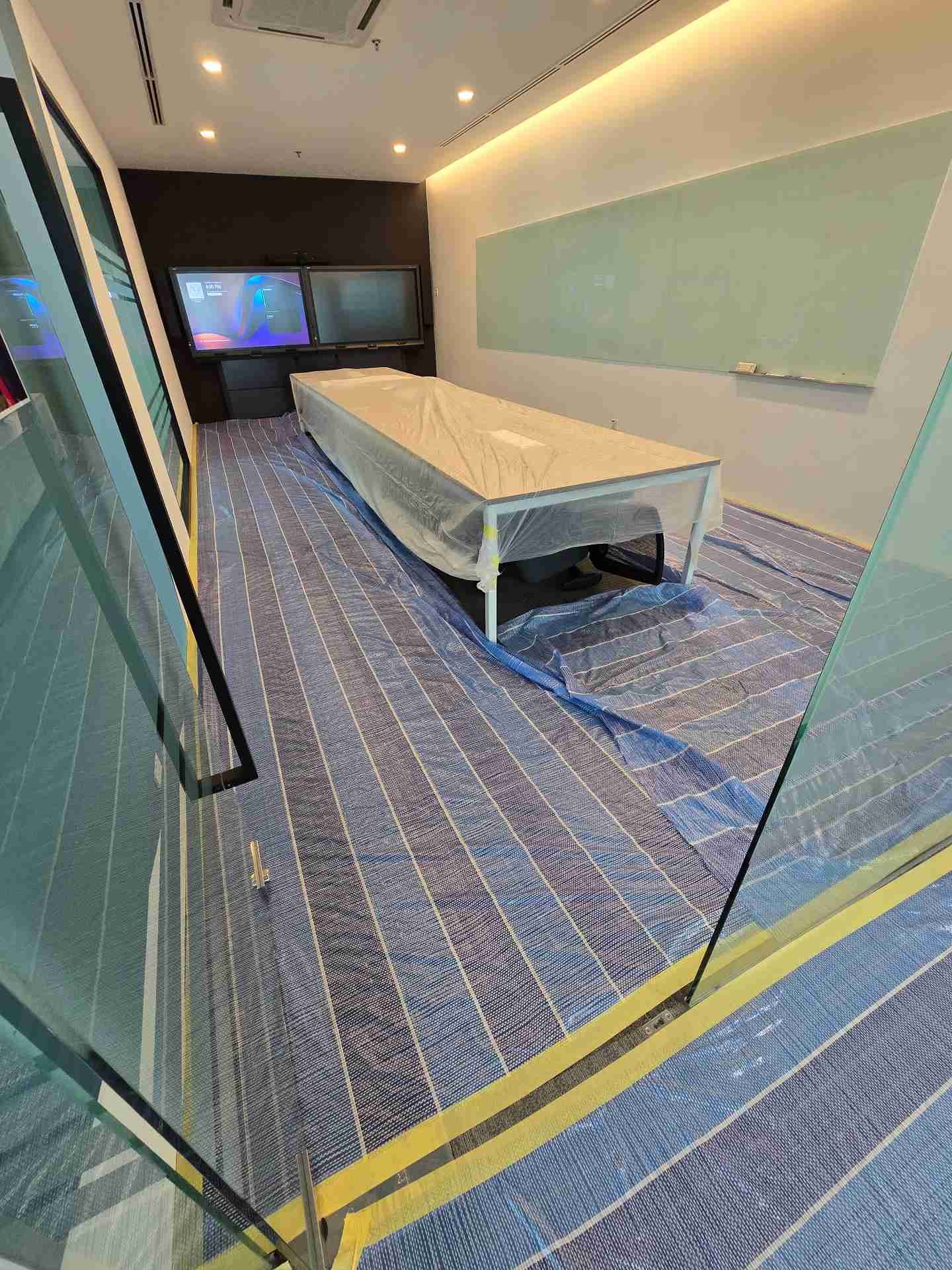 Meeting room setup with carpet tiles and screens at Nasstar Cyberjaya during office fit-out
