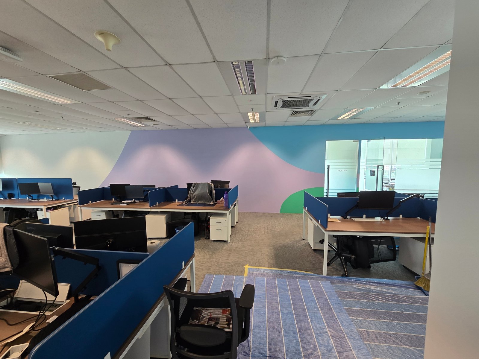 Completed colourful office interior painted by Tresman Painting at Nasstar Cyberjaya