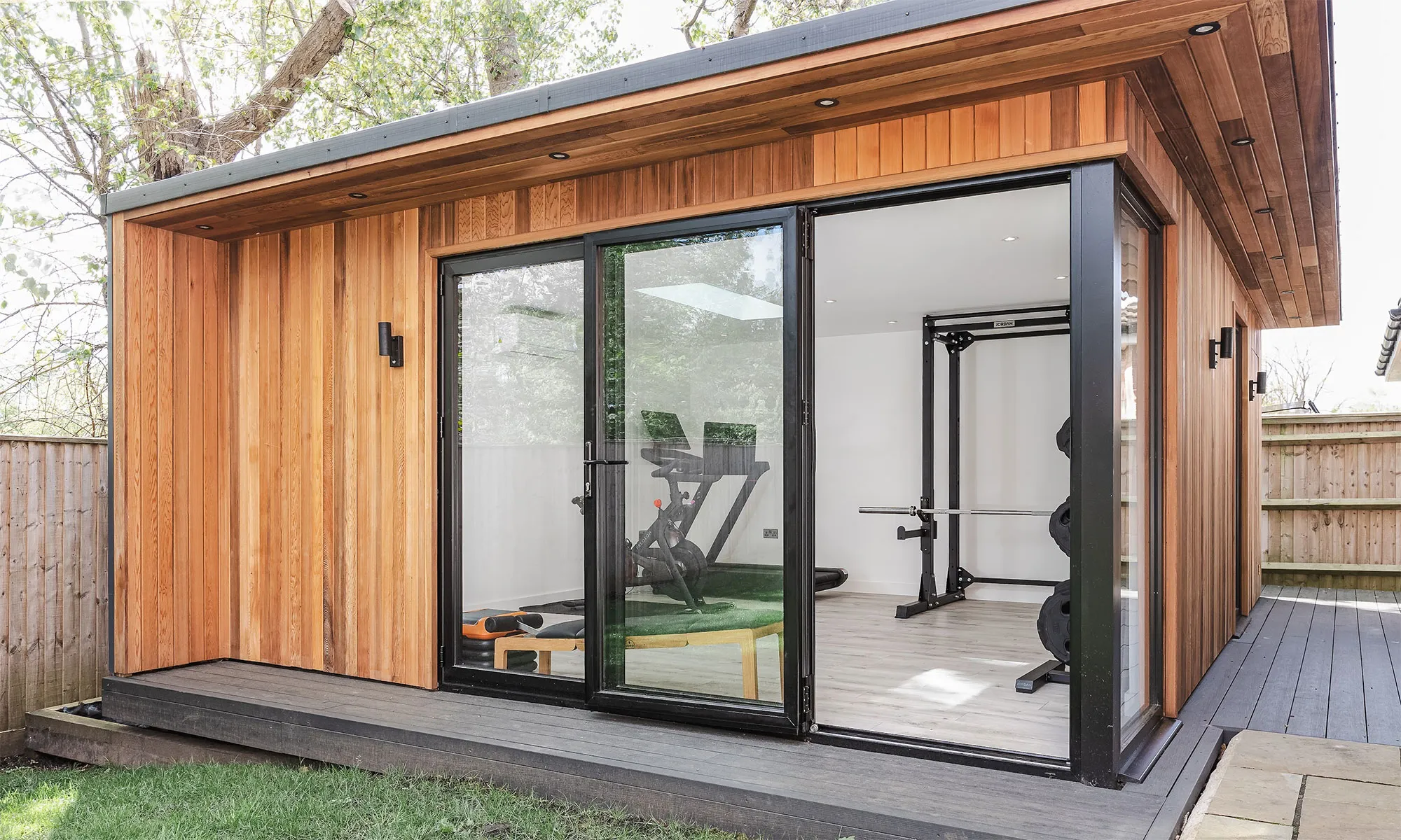 Stylish garden room designed as a Home Gym Garden Rooms