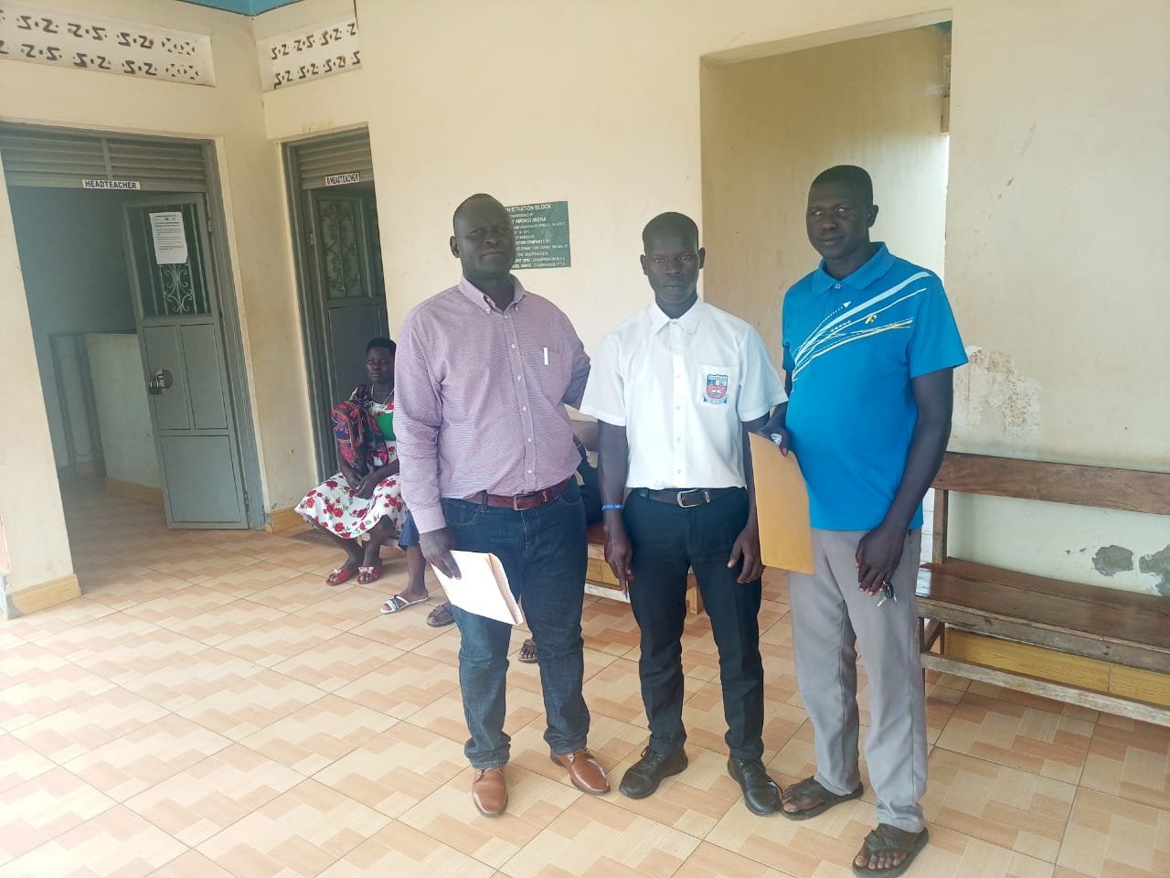 Indoor partnership meeting between staff and school officials
