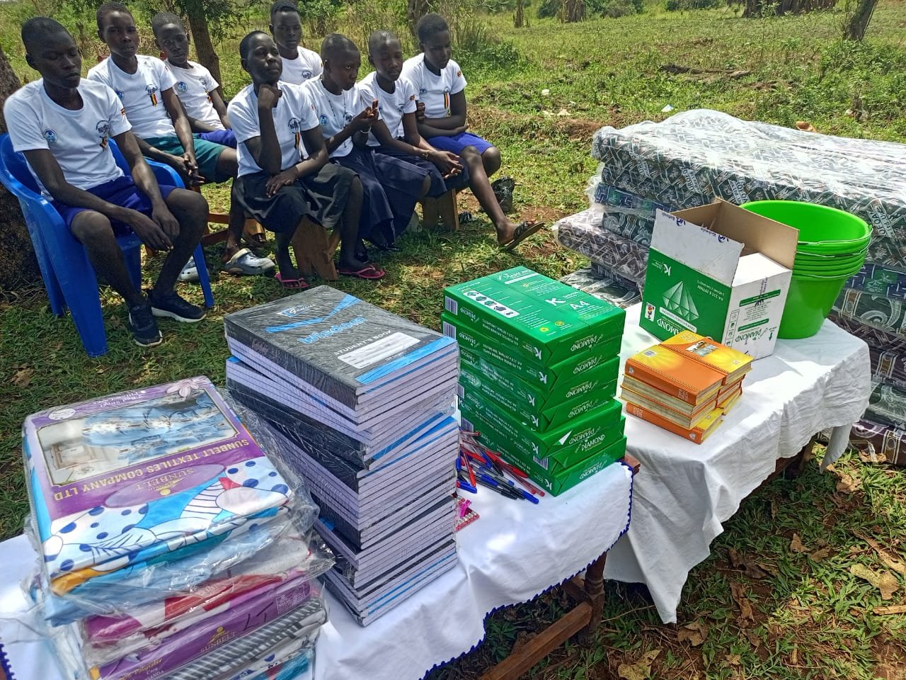 Textbooks, exercise books, and educational supplies distribution event