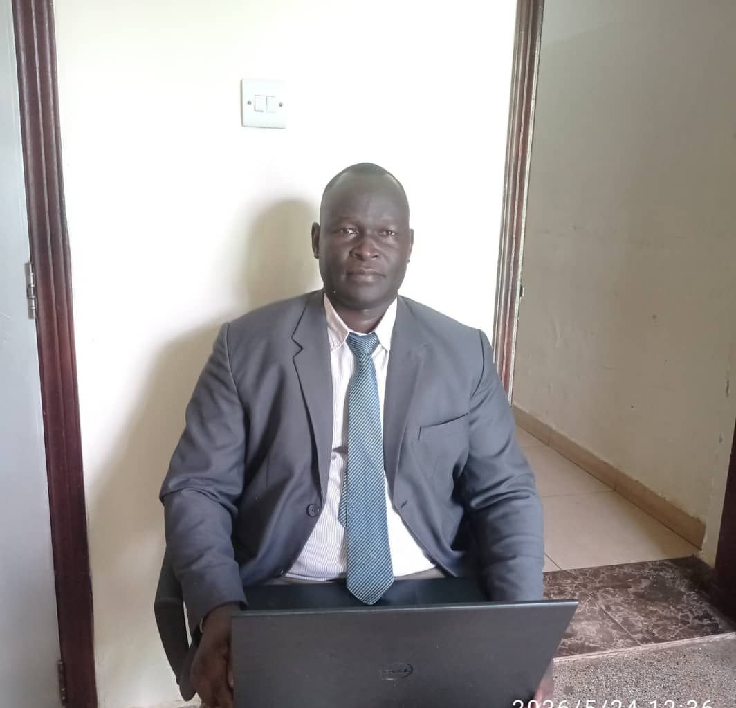 Portrait of Mr. Denis Kangola