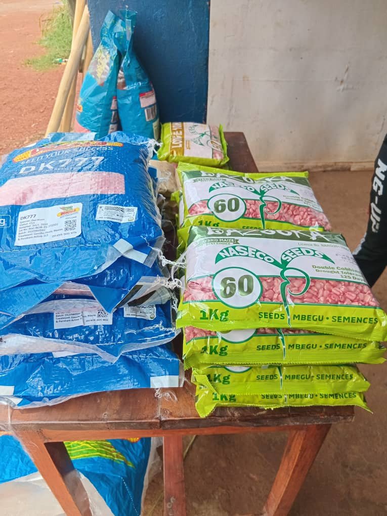 Seeds and agricultural materials in blue and green packaging