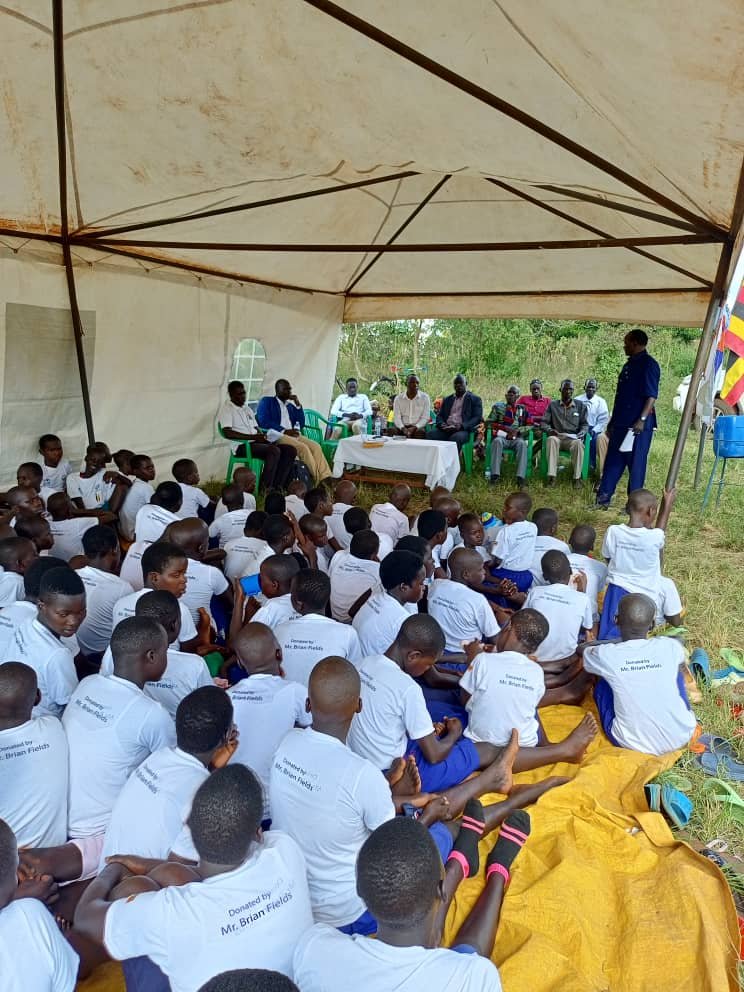 Another view of community members gathered for spiritual fellowship and prayer