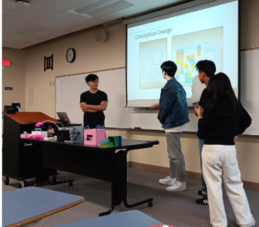 Students presenting a biomedical engineering conceptual design during the 2025 summer research experience at George Fox University