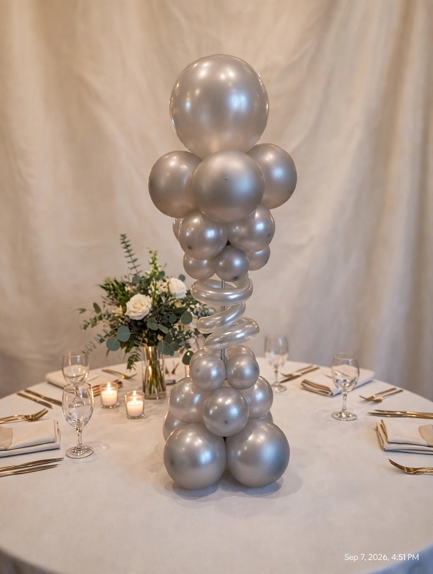 Silver centerpiece column with spiral detail