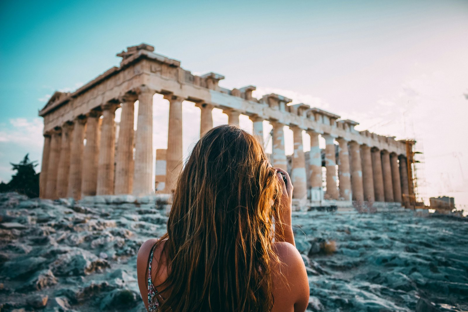 Parthenon at Twilight with Archaeologist