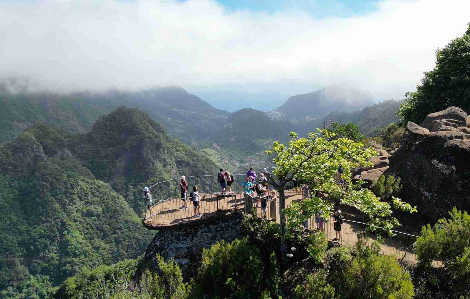 Green mountain valleys and a viewpoint in eastern Madeira