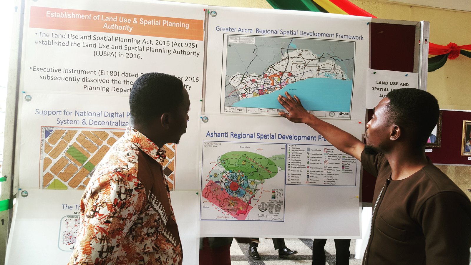 Joe Quarcoo engaging with spatial-development frameworks and LUSPA planning material.