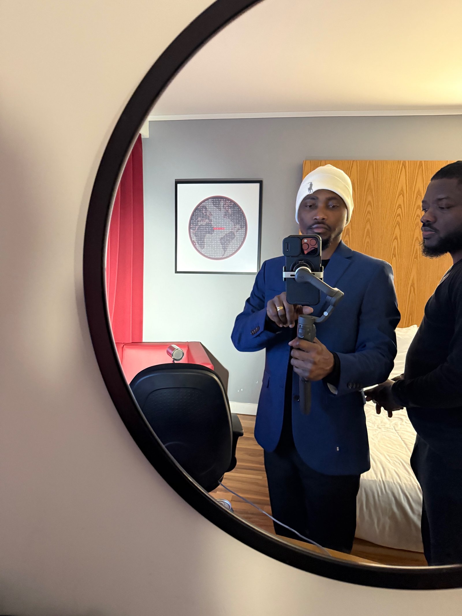 Joe Quarcoo operating filming equipment during an UrbanEverydayUK production.