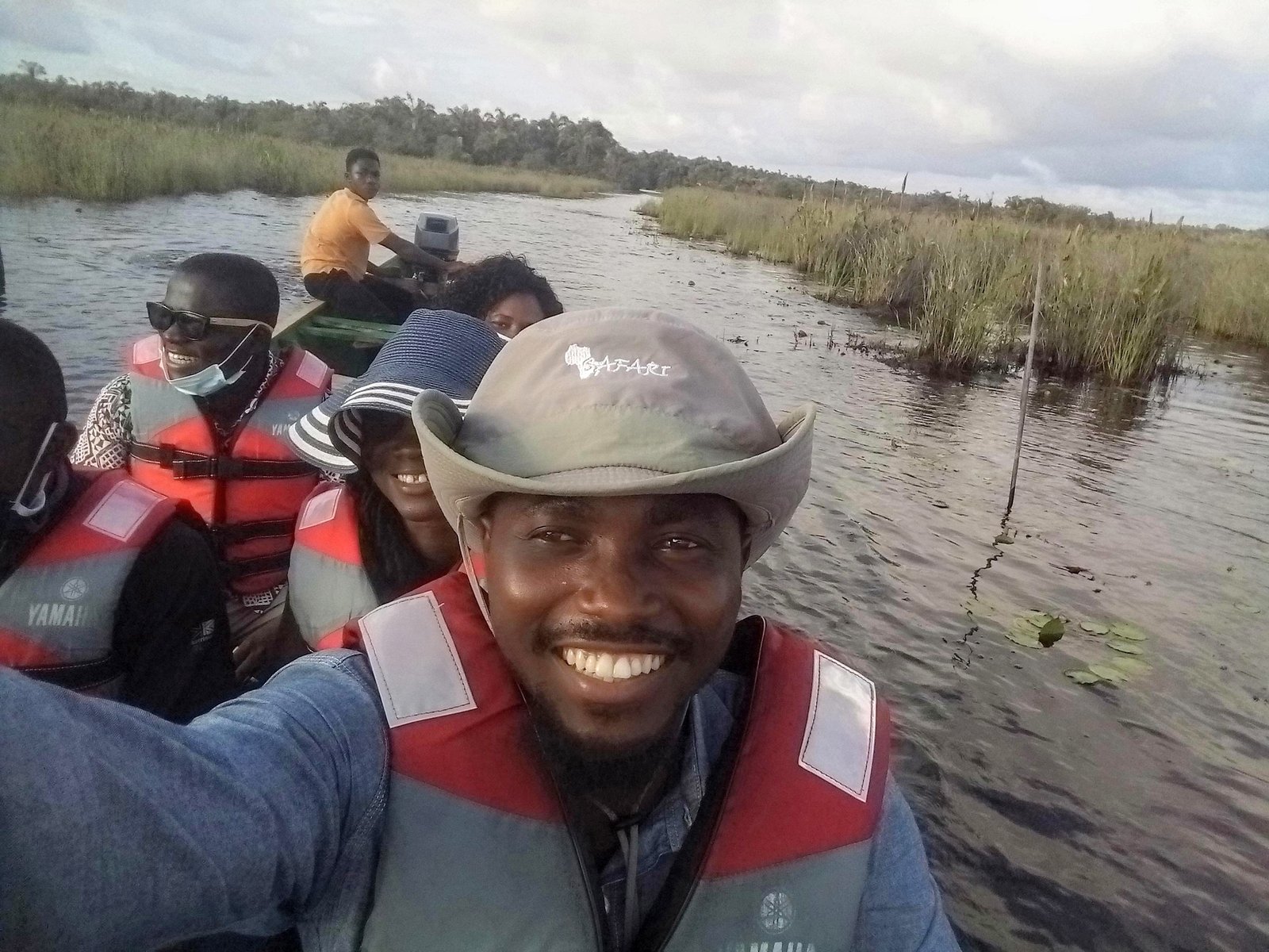 Joe Quarcoo and colleagues travelling by boat during field reconnaissance.
