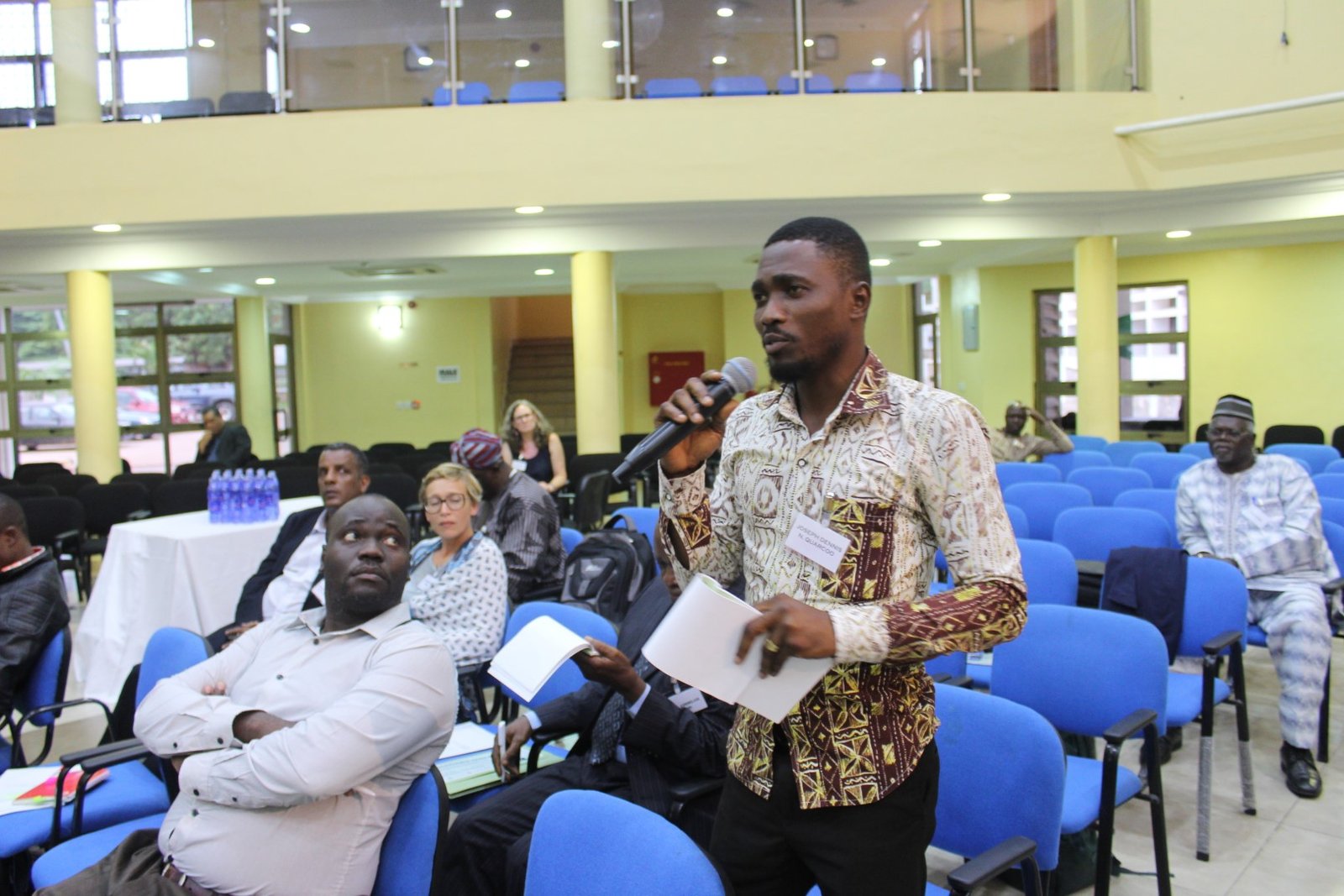 Joe Quarcoo contributing to a discussion at a professional urban-planning conference.