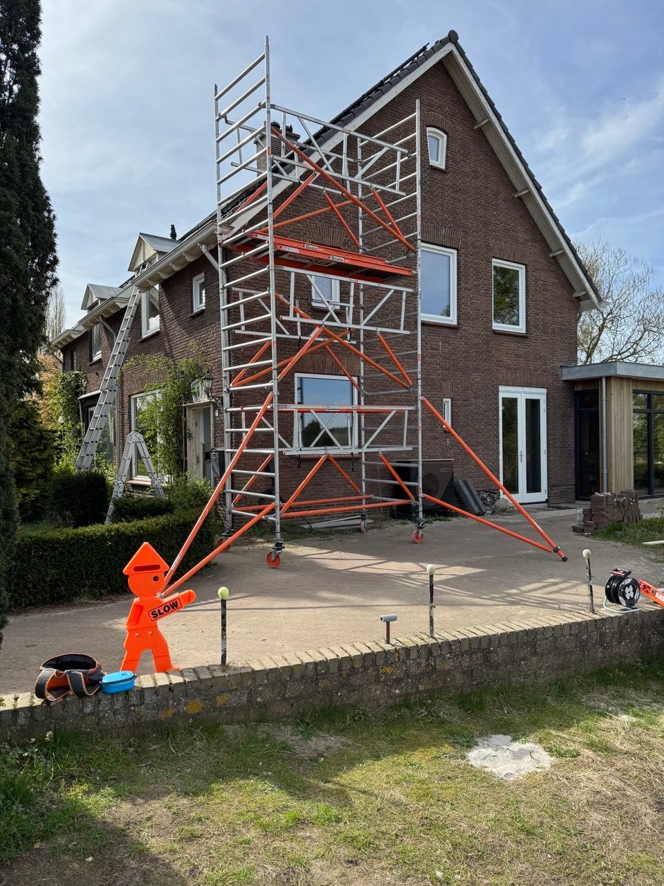 Opknappen van de woninggevel — Schilderwerk