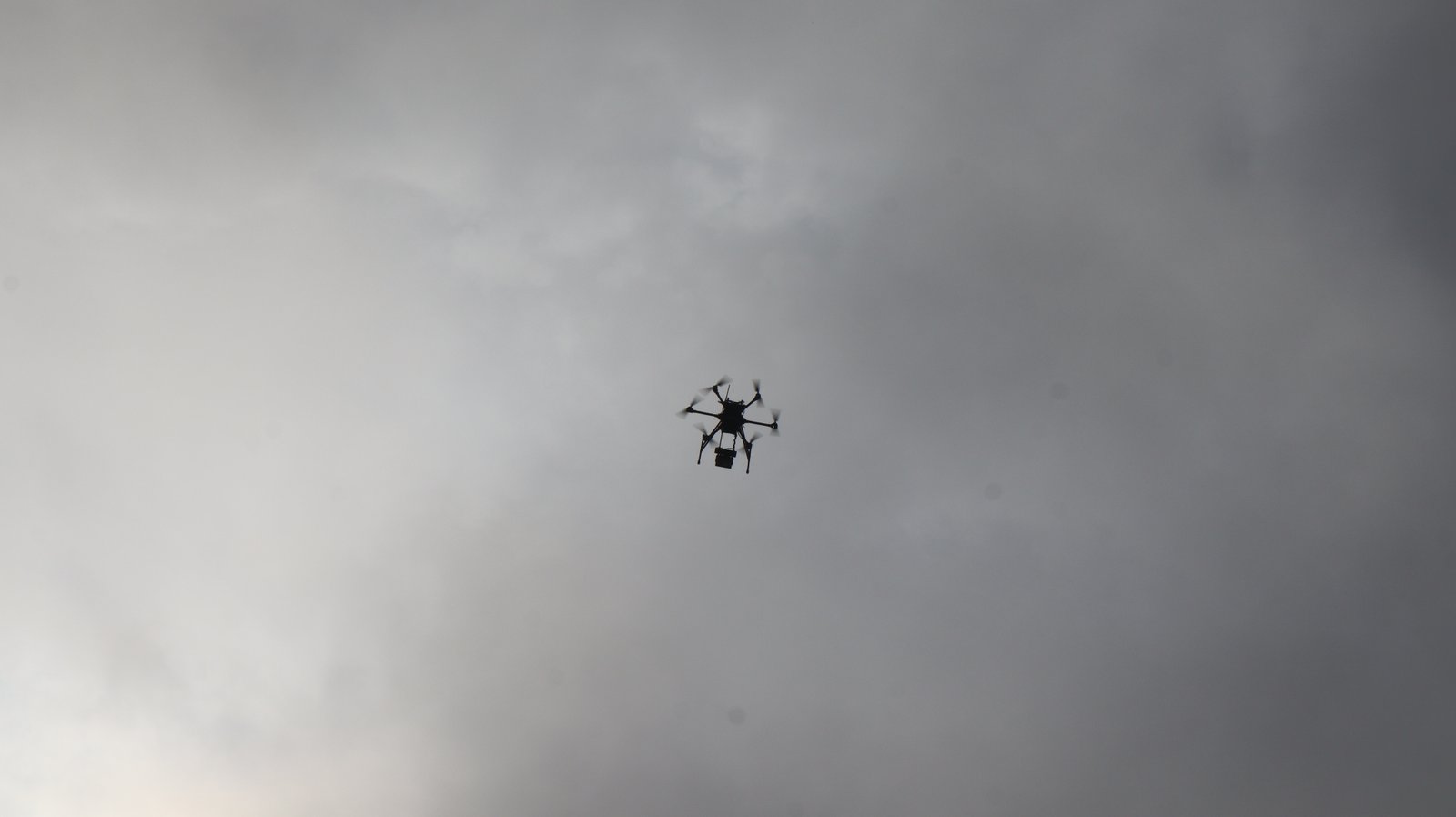 Professional drone capturing aerial view of home renovation project