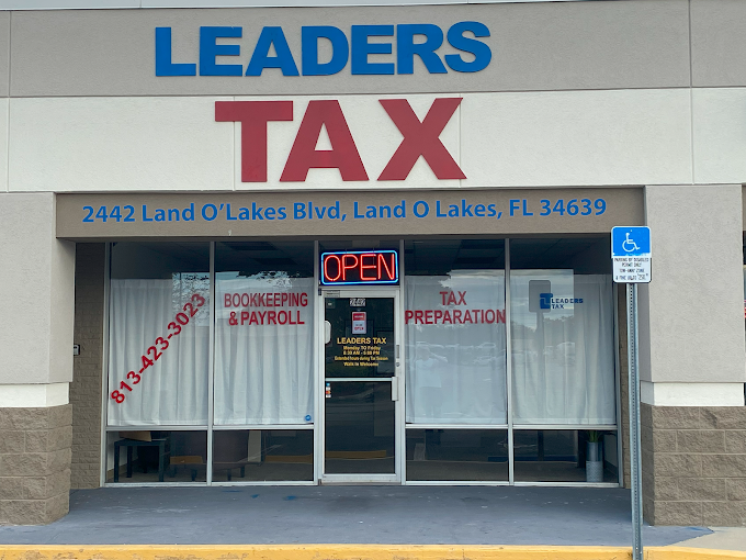 The Leaders Tax storefront entrance at 2442 Land O’ Lakes Boulevard in Land O’ Lakes, Florida.