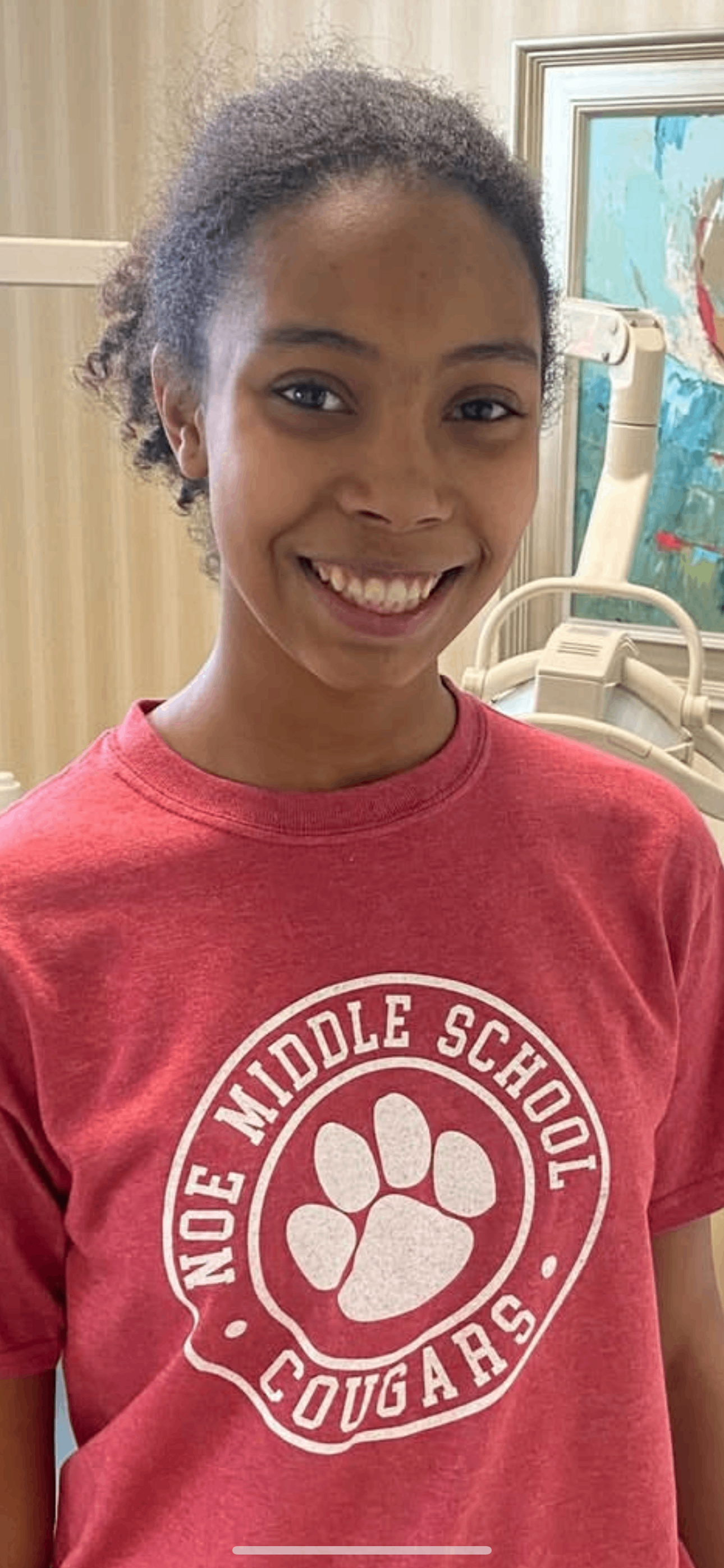 Young patient in Noe Middle School Cougars shirt