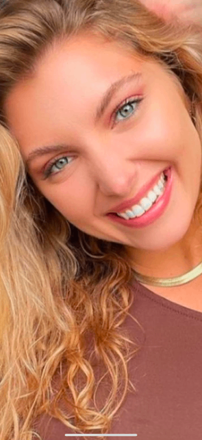 Blonde patient with beautiful smile selfie