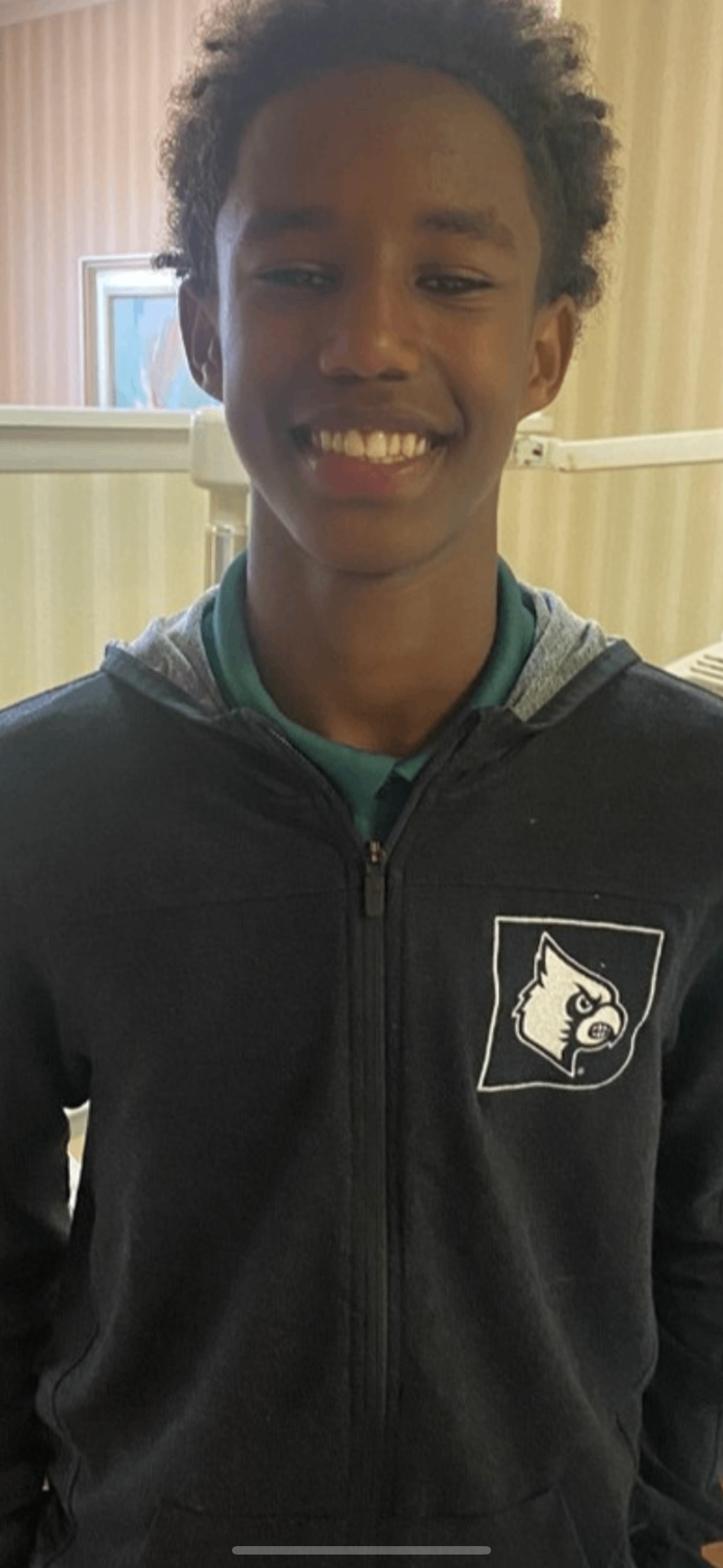 Young male patient in zip-up hoodie
