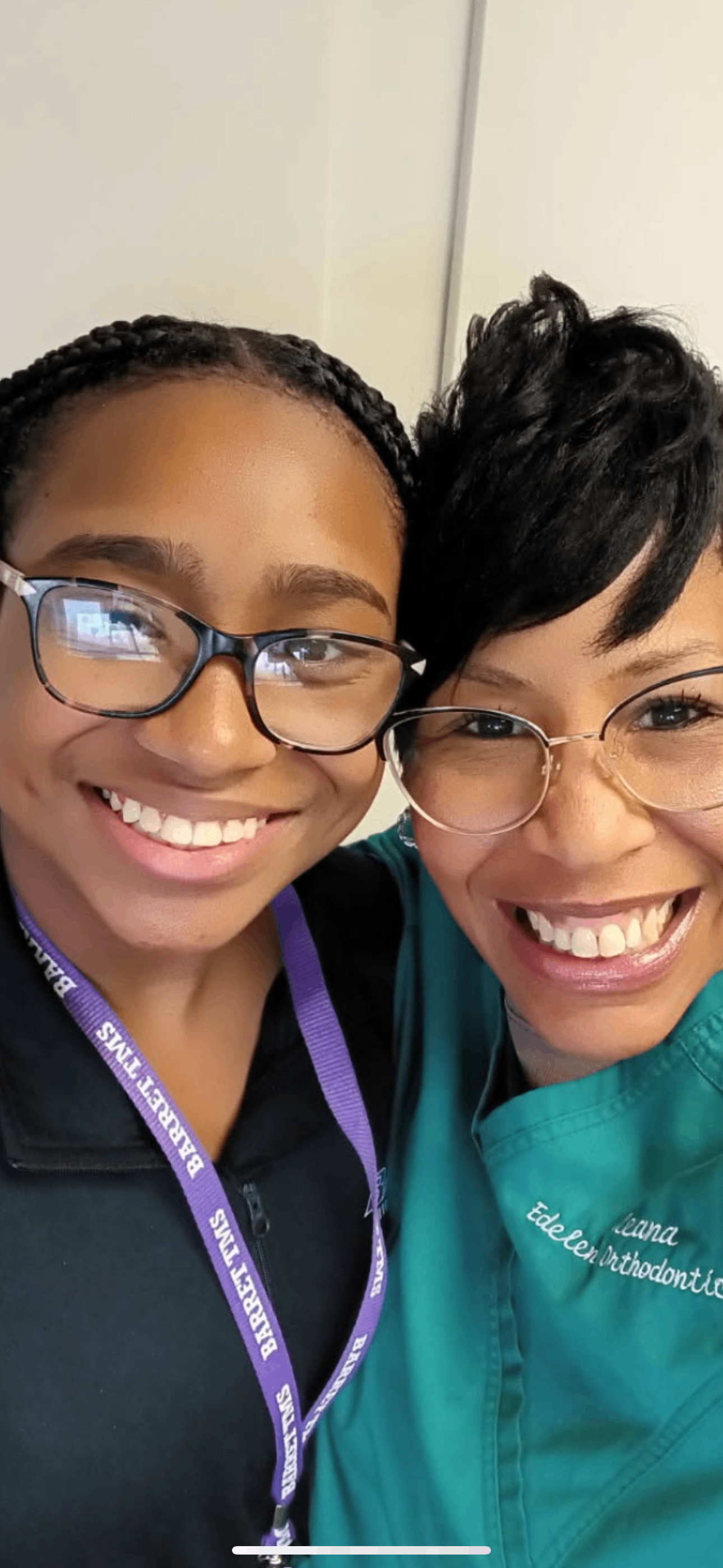 Patient and staff member selfie with smiles