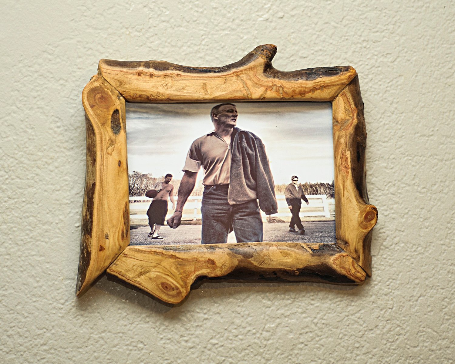 Wood picture frame with sunset photo