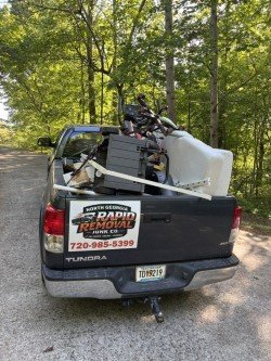 Truck loaded with appliances and household items