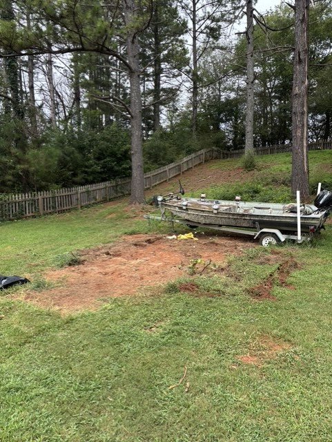 Boat and trailer removal from yard