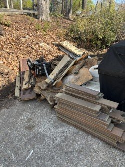 Wood and construction debris loaded on truck bed