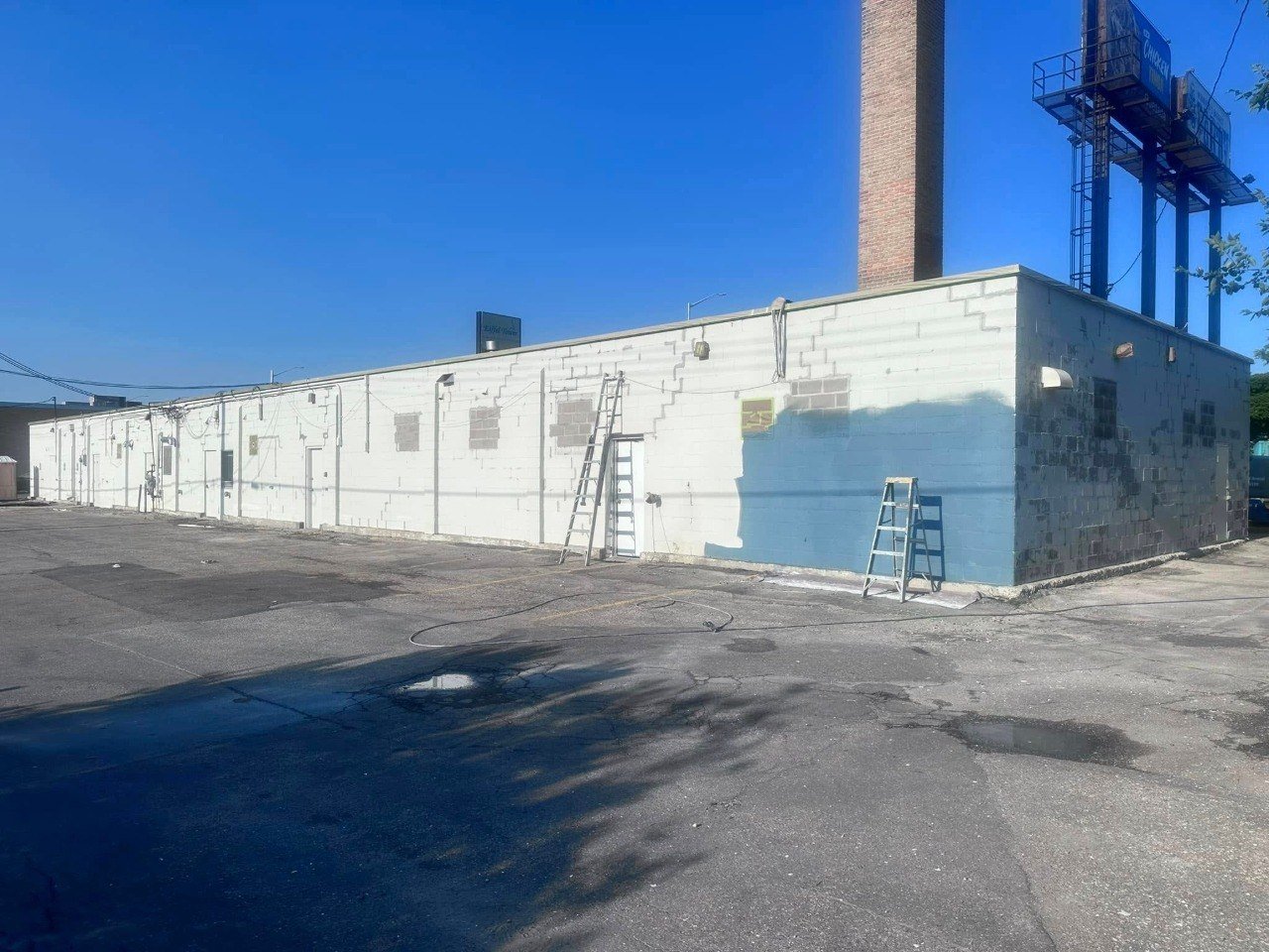Long industrial building mid exterior paint