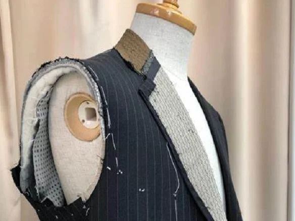 Layered tailored shoulder pads
