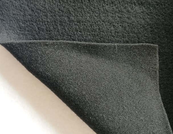 Premium dense needle-punched wool felt batt folded in soft folds