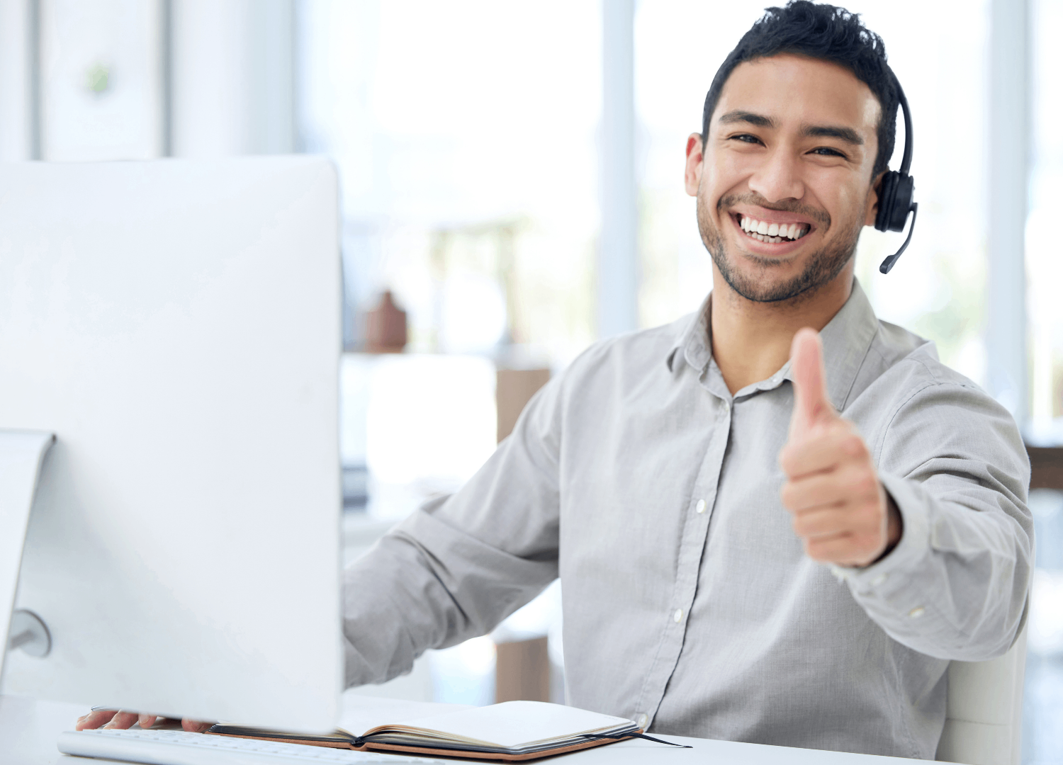 Customer Service Representative Giving Thumbs Up