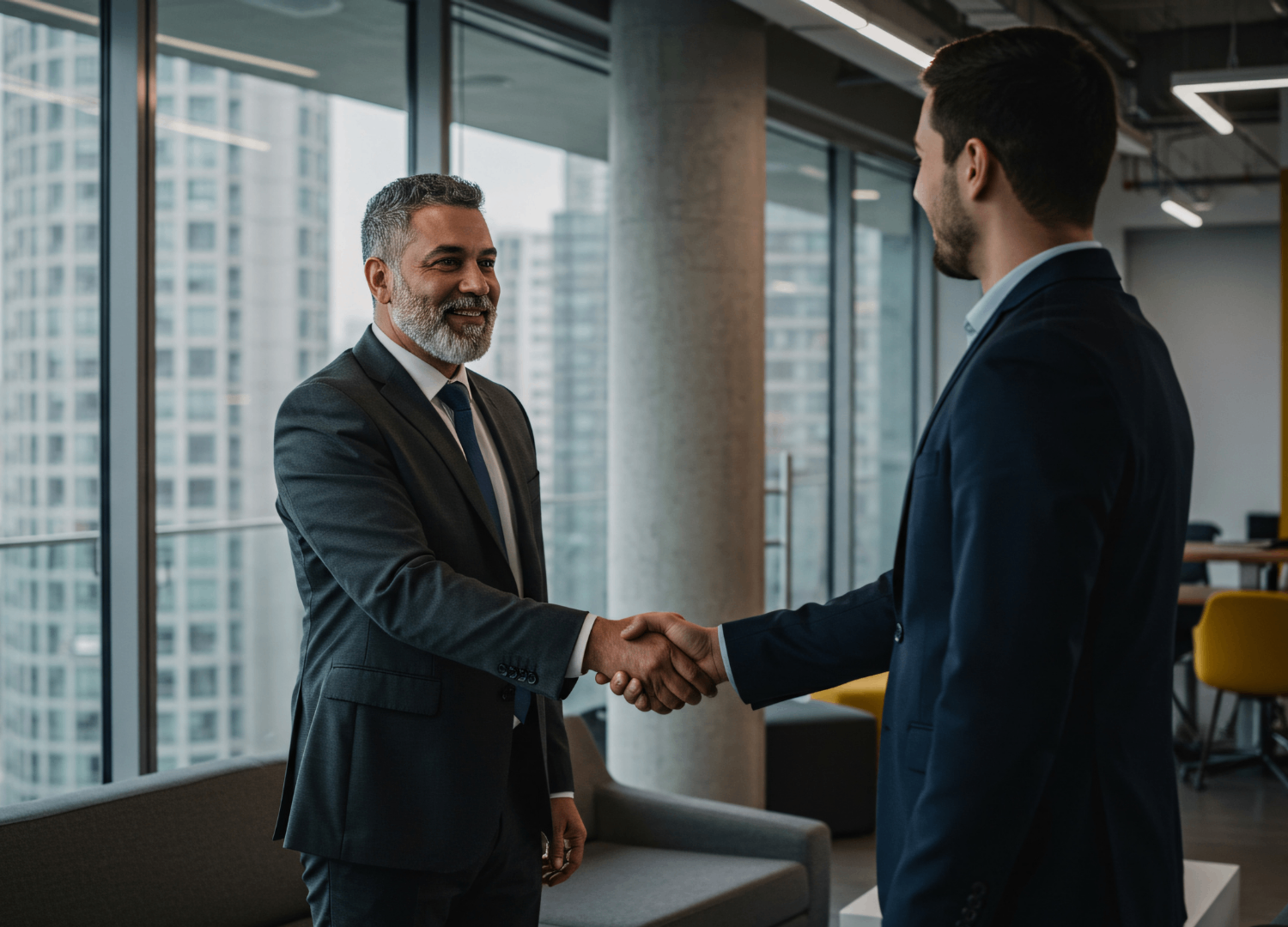 Two businessmen shaking hands in a modern office with city skyline view