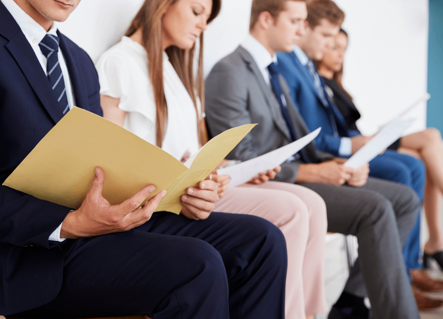 HR professionals discussing documents