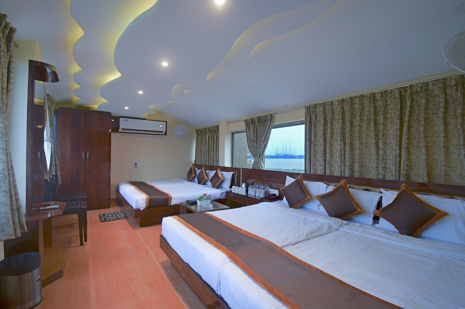 Guest Dorm bedroom with multiple beds and water view
