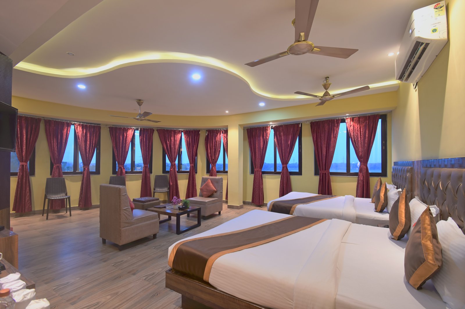 Executive bedroom featuring comfortable king size beds